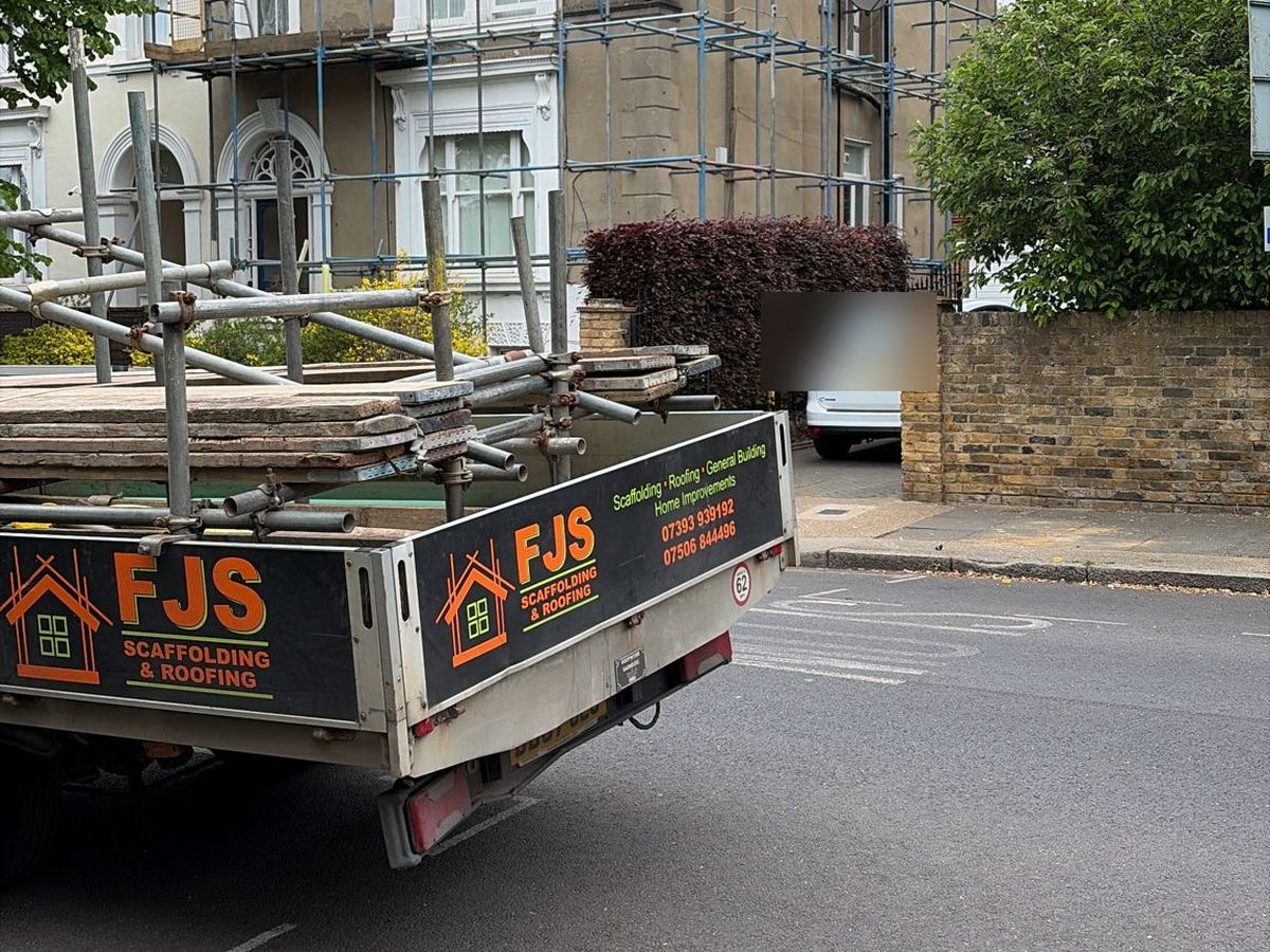 FJS truck loaded with scaffold outside a period property job