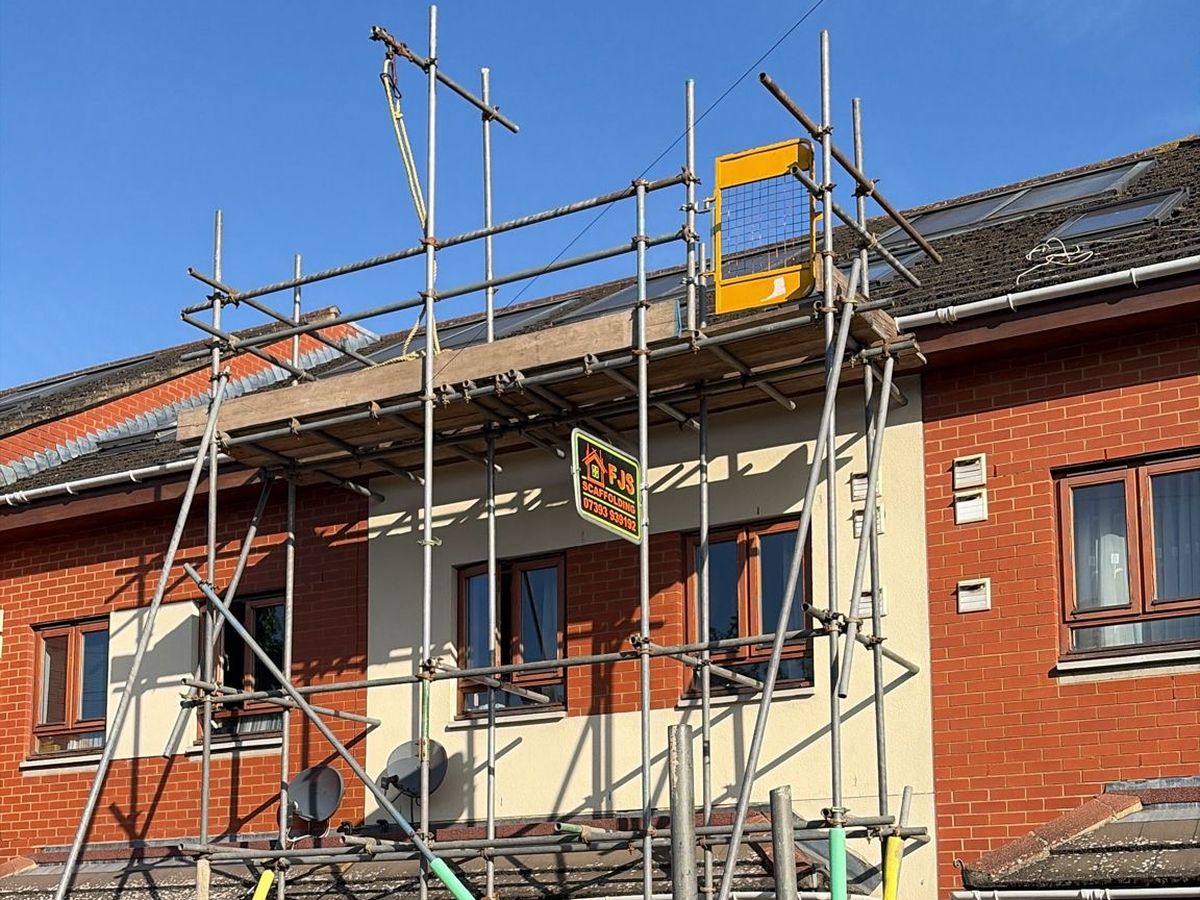 Scaffolding with FJS board on a terraced street
